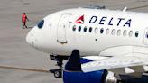 Delta Air Lines says cancellations continue as it tries to restore operations after tech outage