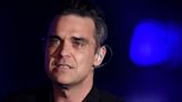 ‘I felt like a charlatan’: Robbie Williams explains his notorious ‘I’m rich’ comment in 2002