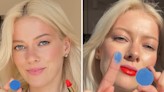 Woman adds blue eye shadow to red lipstick, results not what you'd expect