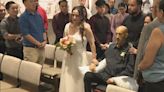 Couple moves wedding to hospital chapel to include father who's battling cancer