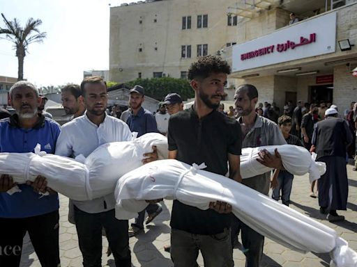 At least 90 Palestinians killed, Gaza officials say, as Israel targets Hamas military chief