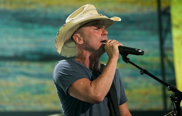 Kenny Chesney 'devastated' after woman falls off escalator and dies at the end of his concert