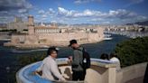 Ship carrying Olympic torch arrives in Marseille amid fanfare and high security