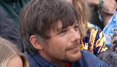 Louis Tomlinson brings a TV to Glastonbury for England match