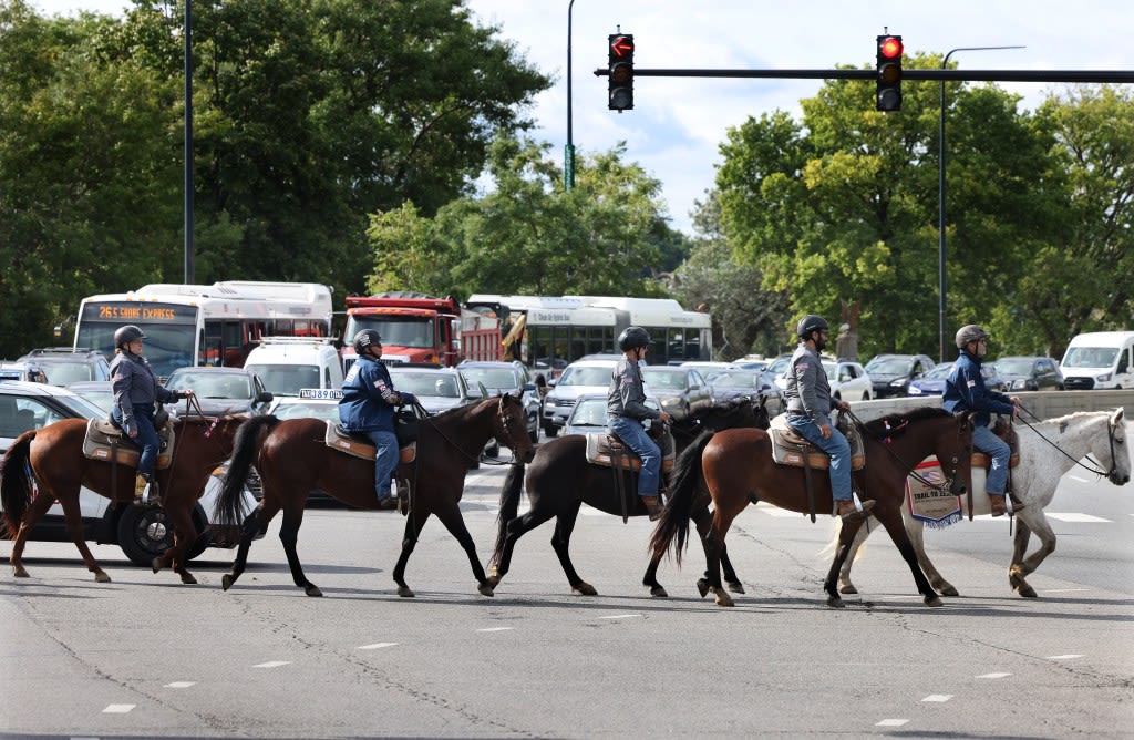 Horses walk along Lake Michigan to raise awareness of veterans’ suicides