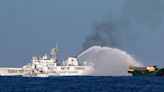 Philippines summons Beijing envoy over South China Sea water cannon attack