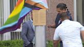 Progress flag raised above Green Bay City Hall in celebration of Pride Month