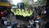 Protesters block coach in bid to stop migrants being moved to Bibby Stockholm