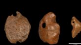 27,000-year-old pendants crafted from the skin of extinct giant sloths could help rewrite the human history of the Americas