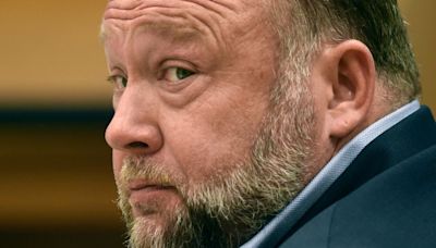 Alex Jones agrees to liquidate his assets to pay Sandy Hook families, in move that would end his ownership of Infowars