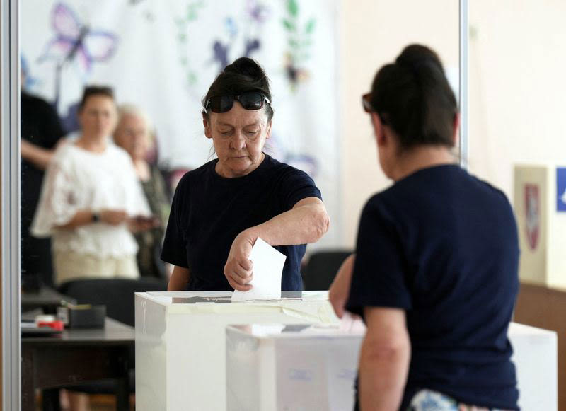 Lithuanians vote in presidential election overshadowed by Russia