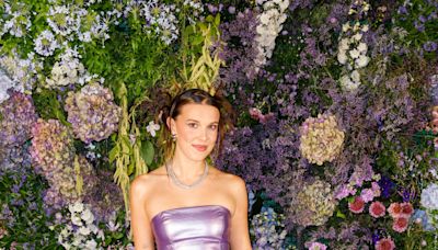 Millie Bobby Brown Is ‘Pool Ready’ in a Metallic Lavender Triangle swimsuit With Denim Shorts