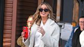 Delta Goodrem channels Hailey Bieber with her lip gloss phone case