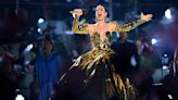 Katy Perry Takes The Coronation Concert Stage In A Plunging Gold Ballgown