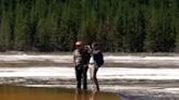 Fury as tourists caught trespassing on Yellowstone’s Grand Prismatic Spring: ‘Unrepairable damage’