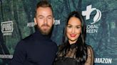 Artem Chigvintsev Reacts to History Behind Nikki Bella's Wedding Dress (Exclusive)