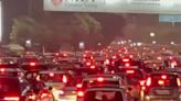 Delhi-Noida flyway hit by traffic congestion after rainfall leaves roads waterlogged | Video