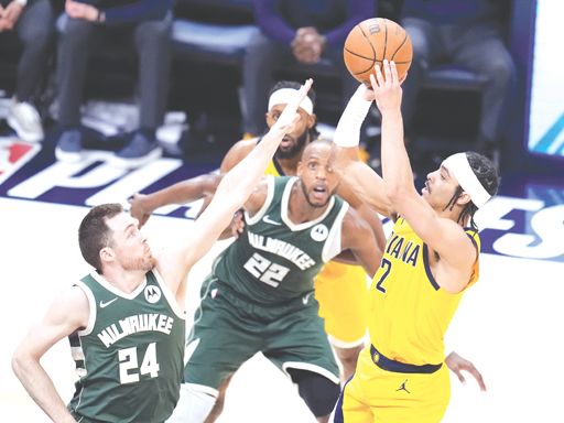 Indiana Pacers celebrate while sending Milwaukee Bucks packing to end their NBA playoff series Thursday