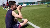 Declan Rice plays photographer during England training session