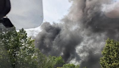 Firefighters battle blaze at south Ottawa auto garage