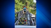 Passengers stranded on sky ride at Southwick Zoo, suspended above animals