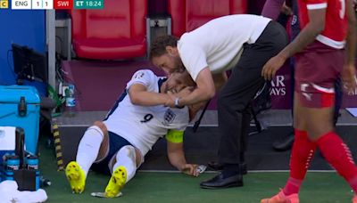 Kane off after crashing into England bench despite Southgate's bid to save him