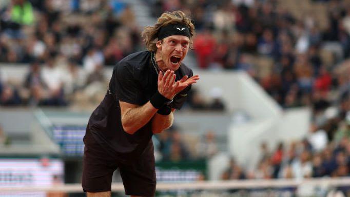Frustrated Rublev throws racquet in surprise Paris loss
