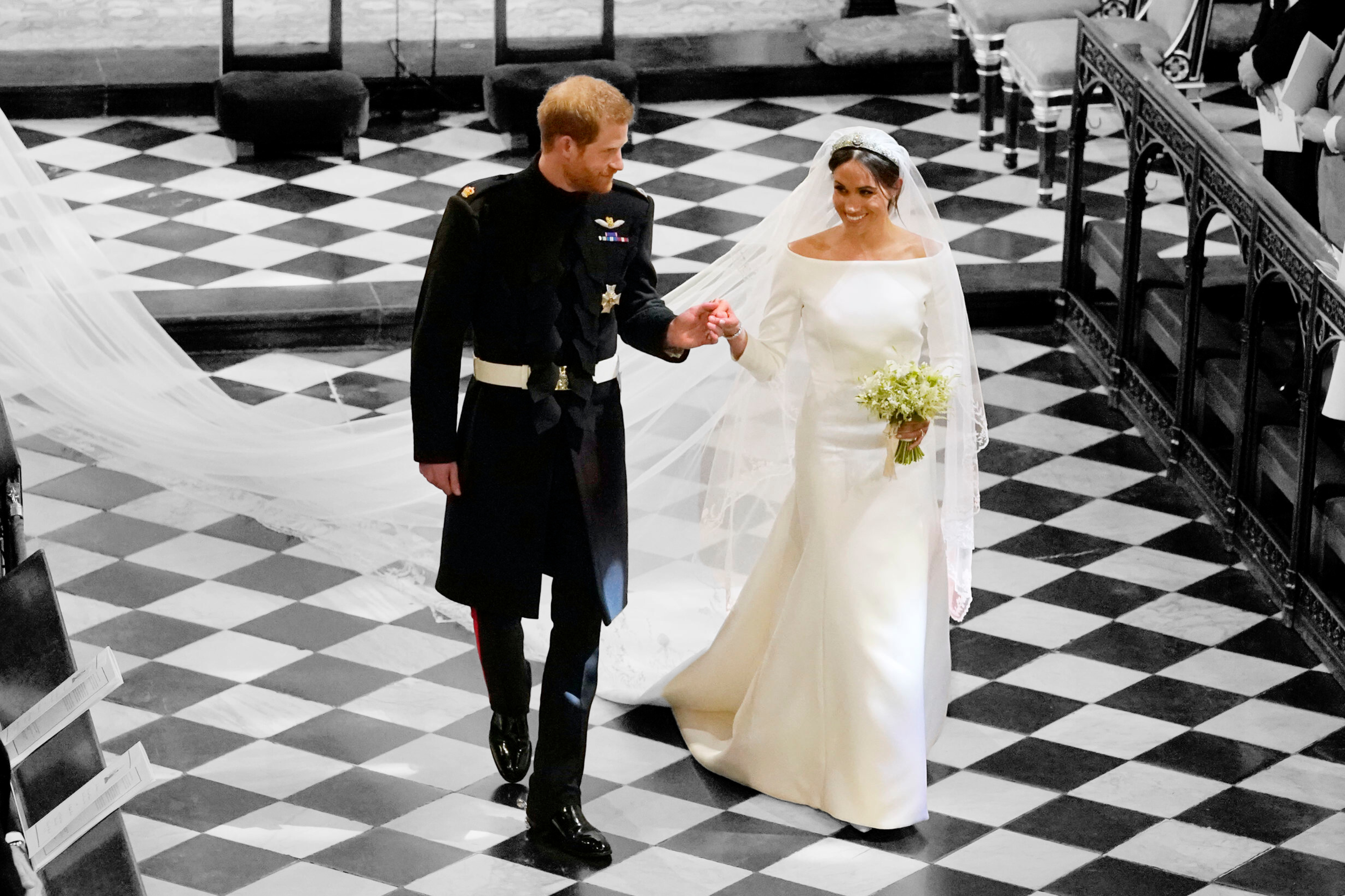 Moment Meghan Markle "floated" down the aisle goes viral