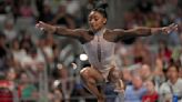 Simone Biles cruises to 9th national title and gives Olympic champ Sunisa Lee a boost along the way