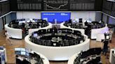 European shares slip after ECB rate hike