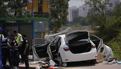 Three people seriously injured after car rams bus stops in Israel