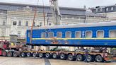 Shelled train car placed on display on Mykhailivska Square in Kyiv for Ukrainian Railway Day