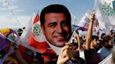 Jailed Kurdish leader quits active politics after party slips in Turkey election