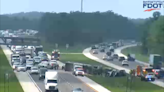 Tractor-trailer overturned on I-75N, traffic moved off-shoulder