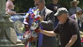 Community members gather at Laurel Hill Cemetery in Philadelphia to honor veterans who made the ultimate sacrifice