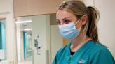 Masks off: Health care workers, without flu vaccine, no longer required to wear a mask