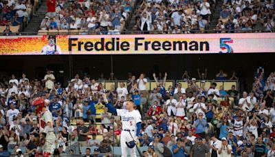 Emotional Freddie Freeman gets hug from Bryce Harper in return to Dodgers as ailing son recovers