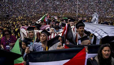 Cheers erupt as pro-Palestinian protesters removed from Michigan graduation