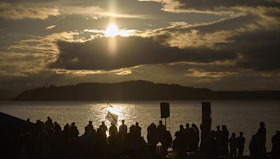 Hundreds gather on a Seattle beach to remember an American activist killed by the Israeli military