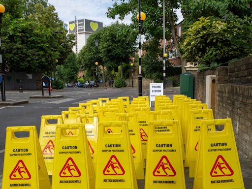 Signs by polling booth near Grenfell Tower warn voters of ‘slippery politicians’