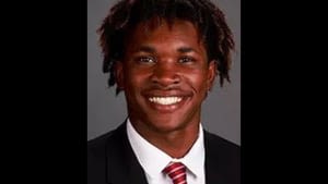 College football player hit, killed while checking on people involved in crash