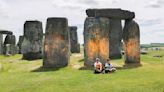 Stonehenge spray-painted orange by protesters calling for climate action