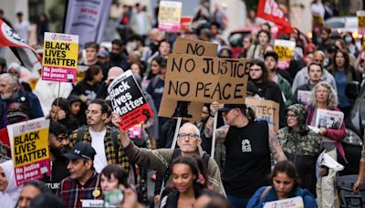 Protest in Manchester after a video of a police officer 'kicking a man' emerges