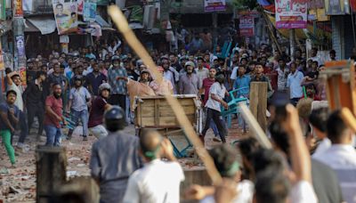 Bangladesh’s top court scales back government jobs quota after deadly unrest that has killed scores