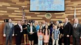 Students recognized for illegal dumping artwork