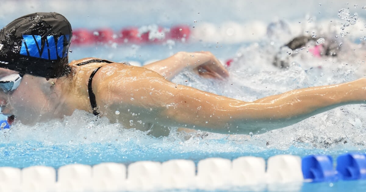 U.S. Olympic swim trials make history with a new world record and epic crowds