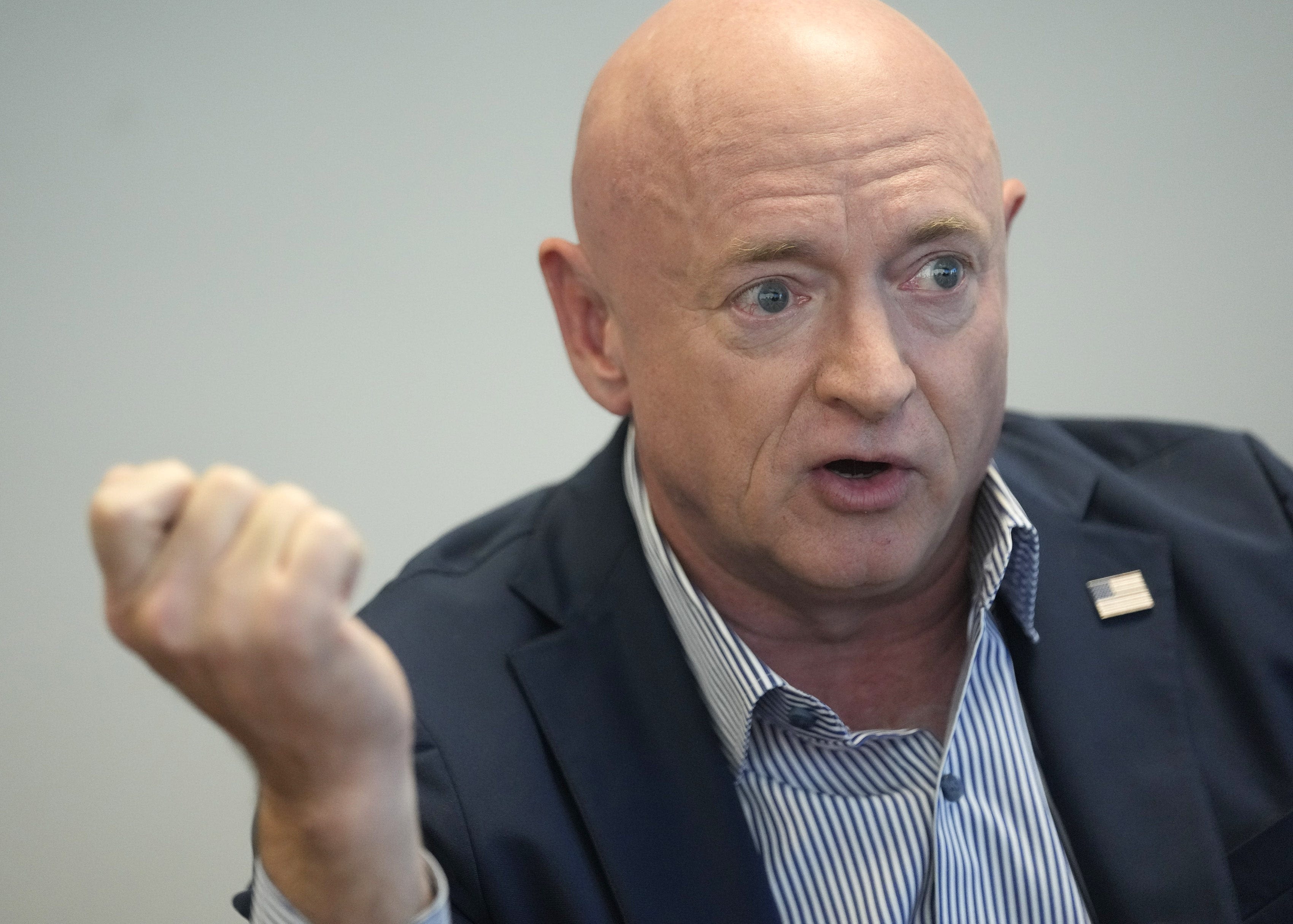 Sen. Mark Kelly finally begins to define himself — as Biden's reelection shill