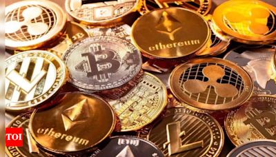 Bitcoin slides to four-month lows even as stocks hit record - Times of India