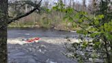 Rescue efforts for canoeists who went over Minnesota waterfall continue; Guard deployed