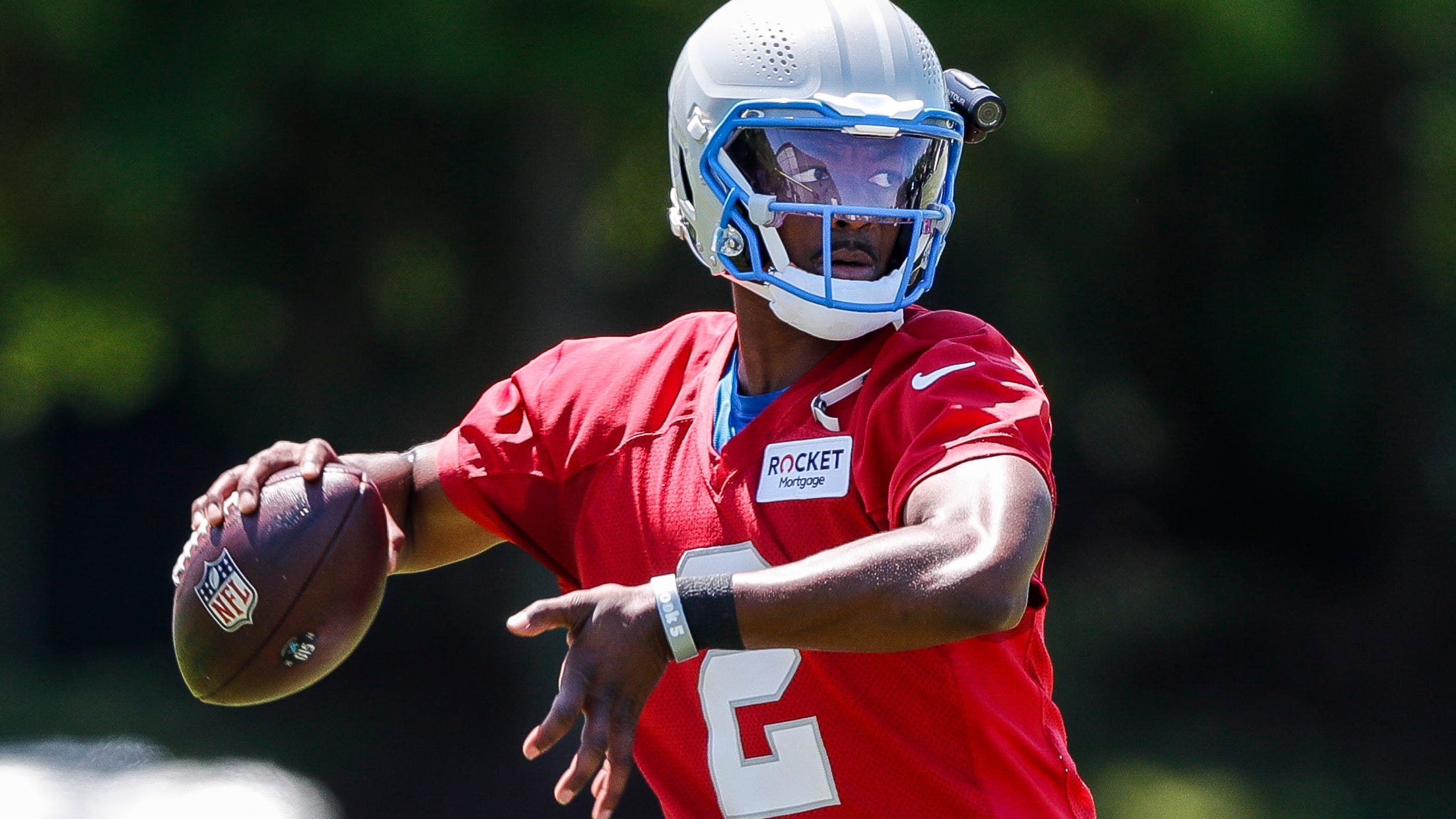 Detroit Lions QB Hendon Hooker working on footwork, commanding a huddle this offseason